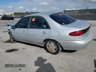 1997 Ford Escort LX with VIN 1FALP13P2VW282739, listed as a Copart auction lot 45139215 with 105,095 mi miles and Salvage Title. Bid and sale history available at carsss.com. Image 2.
