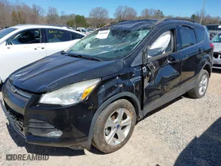 2015 Ford Escape SE with VIN 1FMCU0GX6FUA64772, listed as a IAAI auction lot 41824000 with 140,995 mi miles. Bid and sale history available at carsss.com. Image 2.