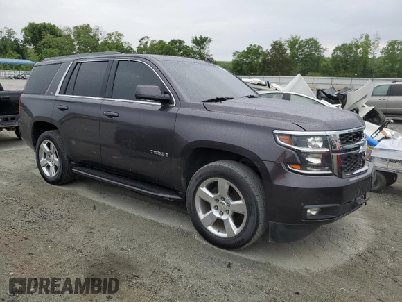 2015 Chevrolet Tahoe LT with VIN 1GNSCBKC9FR118286, listed as a Copart auction lot 56168375 with 144,824 mi miles and Salvage title. Bid and sale history available at DreamBid. Image 4.
