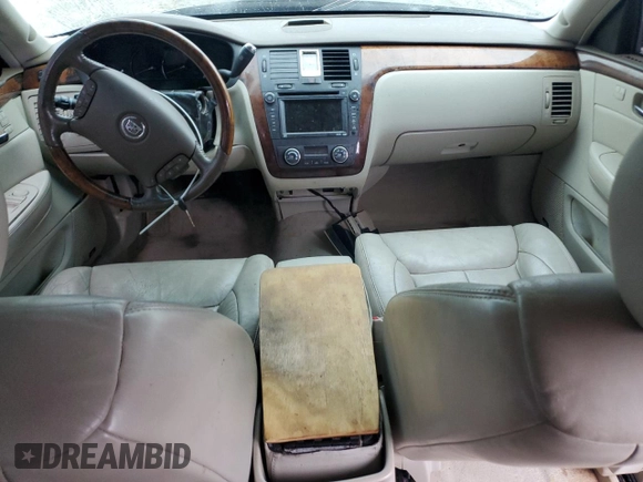 2006 Cadillac DTS 1SD z VIN 1G6KD57YX6U193025, wystawiony jako Copart lot #45784605 z przebiegiem Nie podano mil oraz Szkody całkowita. Historia ofert i sprzedaży dostępna na DreamBid. Obrazek 8.