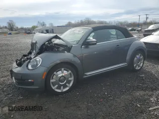 2014 Volkswagen Beetle 1.8T with VIN 3VW517AT1EM815958, listed as a Copart auction lot 51710045 with Not provided miles and Salvage title. Bid and sale history available at DreamBid. Image 1.