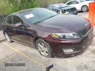 2015 Kia Optima LX with VIN 5XXGM4A79FG494002, listed as a IAAI auction lot 42082041 with 179,076 mi miles. Bid and sale history available at carsss.com. Image 1.