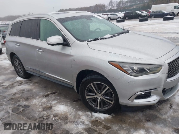 2016 Infiniti QX60 with VIN 5N1AL0MMXGC505959, listed as a IAAI auction lot 41513268 with 130,142 mi miles and . Bid and sale history available at DreamBid. Image 1.
