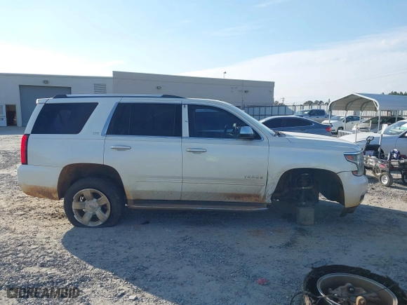 2015 Chevrolet Tahoe LTZ with VIN 1GNSCCKCXFR287609, listed as a IAAI auction lot 41688936 with 112,678 mi miles. Bid and sale history available at carsss.com. Image 14.