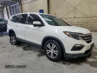 2018 Honda Pilot EX-L with VIN 5FNYF6H62JB043318, listed as a Copart auction lot 57853335 with 57,354 mi miles and Salvage title. Bid and sale history available at DreamBid. Image 4.