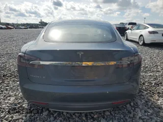 2013 Tesla Model S z VIN 5YJSA1AC4DFP10496, wystawiony jako Copart lot #63801355 z przebiegiem 50 473 mil mil oraz Czysty tytuł • Clean title. Historia ofert i sprzedaży dostępna na DreamBid. Obrazek 6.