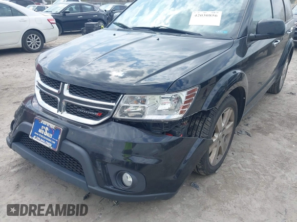 2014 Dodge Journey Limited with VIN 3C4PDDDG6ET118355, listed as a IAAI auction lot 42030856 with 164,740 mi miles and . Bid and sale history available at carsss.com. Image 6.
