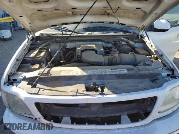 1999 Ford F-150 XL с VIN 1FTRX08L3XKB18916, выставлен на аукционе Copart как лот 81892064 с пробегом 175 280 миль миль и Списание • Salvage title. История ставок и продаж доступна на DreamBid. Изображение 12.