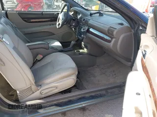 2004 Chrysler Sebring Limited with VIN 1C3EL65R44N228569, listed as a IAAI auction lot 41841279 with 182,964 mi miles and . Bid and sale history available at DreamBid. Image 5.