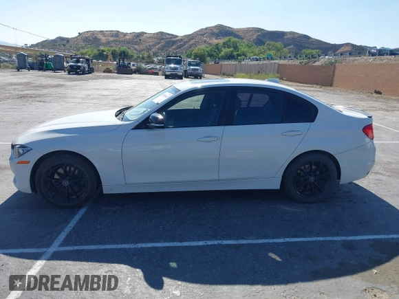 2014 BMW 3 Series 328d with VIN WBA3D3C5XEK156288, listed as a IAAI auction lot 42301663 with 84,416 mi miles and . Bid and sale history available at DreamBid. Image 14.