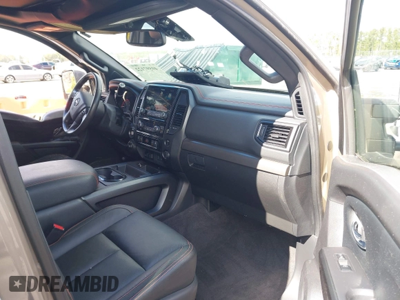 2021 Nissan Titan Pro-4X with VIN 1N6AA1ED4MN531369, listed as a IAAI auction lot 40597122 with 32,161 mi miles and . Bid and sale history available at DreamBid. Image 5.