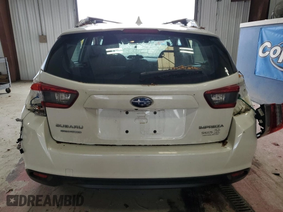 2023 Subaru Impreza Premium z VIN 4S3GTAV61P3715502, wystawiony jako Copart lot #55922275 z przebiegiem 16 088 mil mil oraz Szkoda całkowita • Salvage title. Historia ofert i sprzedaży dostępna na DreamBid. Obrazek 6.