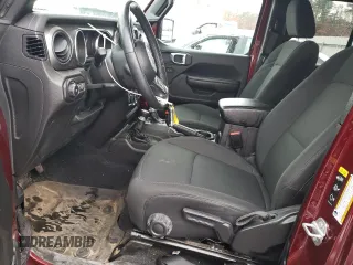 2022 Jeep Wrangler Unlimited High Tide with VIN 1C4HJXDG5NW145748, listed as a Copart auction lot 83384704 with 30,161 mi miles and Salvage Title. Bid and sale history available at DreamBid. Image 7.