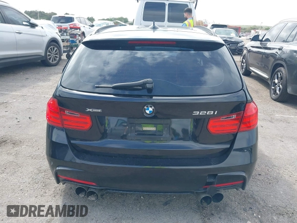 2014 BMW 3 Series 328i xDrive with VIN WBA3G7C57EKN37319, listed as a IAAI auction lot 41699235 with 93,671 mi miles and . Bid and sale history available at carsss.com. Image 16.