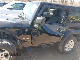 2009 Jeep Wrangler X with VIN 1J4FA24109L754379, listed as a IAAI auction lot 41754925 with 132,500 mi miles and . Bid and sale history available at DreamBid. Image 14.