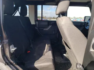 2018 Jeep Wrangler JK Unlimited Sport with VIN 1C4BJWDG9JL894502, listed as a Copart auction lot 89360855 with 100,944 mi miles and Salvage Title. Bid and sale history available at carsss.com. Image 11.