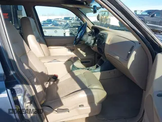 1998 Ford Explorer XL z VIN 1FMZU34E0WZA63165, wystawiony jako IAAI lot #42062724 z przebiegiem 140 575 mil mil oraz . Historia ofert i sprzedaży dostępna na DreamBid. Obrazek 5.