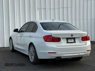 2013 BMW 3 Series 328i with VIN WBA3C1C59DF437433, listed as a Copart auction lot 65803415 with 103,062 mi miles and Clean title. Bid and sale history available at DreamBid. Image 3.