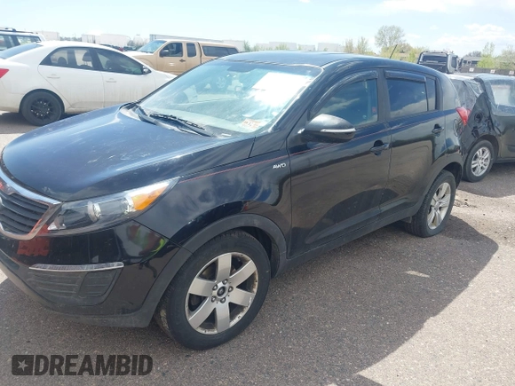 2012 Kia Sportage LX with VIN KNDPBCA20C7287166, listed as a IAAI auction lot 42088019 with 159,577 mi miles and . Bid and sale history available at DreamBid. Image 2.
