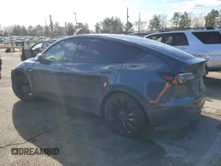 2022 Tesla Model Y Performance with VIN 7SAYGDEF0NF452111, listed as a Copart auction lot 47595975 with 33,514 mi miles and Salvage Title. Bid and sale history available at DreamBid. Image 2.