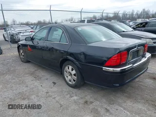 2002 Lincoln LS w/Base Pkg with VIN 1LNHM86S82Y701044, listed as a IAAI auction lot 41592614 with 192,902 mi miles. Bid and sale history available at carsss.com. Image 3.