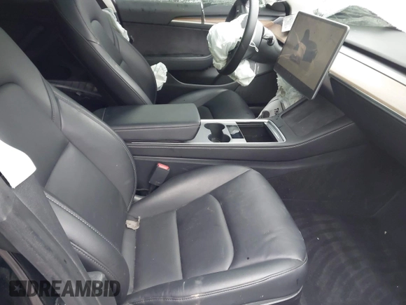 2023 Tesla Model 3 z VIN 5YJ3E1EA1PF512562, wystawiony jako IAAI lot #41719618 z przebiegiem 43 612 mil mil oraz . Historia ofert i sprzedaży dostępna na DreamBid. Obrazek 5.