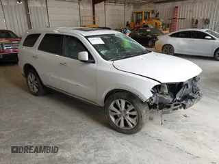 2013 Dodge Durango Crew z VIN 1C4SDJDT3DC540700, wystawiony jako IAAI lot #42097270 z przebiegiem 197 195 mil mil oraz . Historia ofert i sprzedaży dostępna na DreamBid. Obrazek 1.