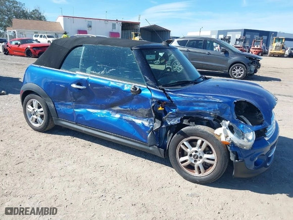 2013 MINI Cooper Convertible with VIN WMWZN3C56DT135566, listed as a IAAI auction lot 41414064 with 58,593 mi miles. Bid and sale history available at carsss.com. Image 1.