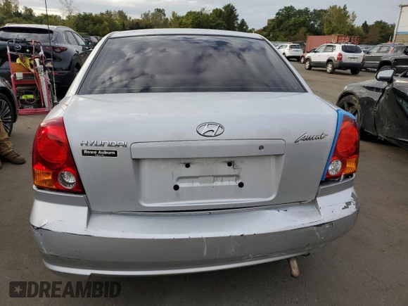 2005 Hyundai Accent GLS with VIN KMHCG45C45U631414, listed as a Copart auction lot 73963814 with 106,617 mi miles and Salvage Title. Bid and sale history available at carsss.com. Image 6.