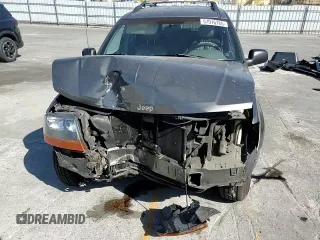 2000 Jeep Grand Cherokee Laredo with VIN 1J4G248S2YC377133, listed as a Copart auction lot 57916785 with 217,525 mi miles and Salvage title. Bid and sale history available at DreamBid. Image 14.