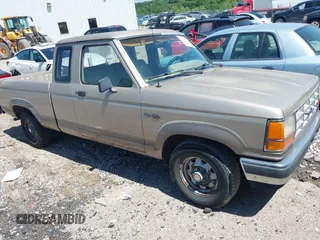 1989 Ford Ranger z VIN 1FTCR14T7KPB54101, wystawiony jako IAAI lot #42256189 z przebiegiem 135 648 mil mil oraz . Historia ofert i sprzedaży dostępna na DreamBid. Obrazek 1.