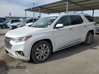 2019 Chevrolet Traverse Premier with VIN 1GNERKKW3KJ147054, listed as a Copart auction lot 59191225 with 112,436 mi miles and Salvage title. Bid and sale history available at DreamBid. Image 1.
