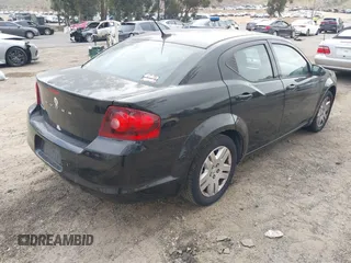 2014 Dodge Avenger SE with VIN 1C3CDZAB0EN183050, listed as a IAAI auction lot 42109104 with 108,732 mi miles. Bid and sale history available at carsss.com. Image 4.