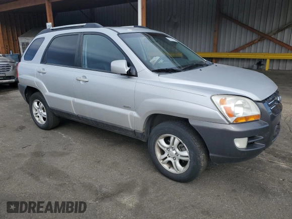 2005 Kia Sportage LX with VIN KNDJE723457117231, listed as a Copart auction lot 50163165 with 97,273 mi miles and Salvage Title. Bid and sale history available at carsss.com. Image 4.