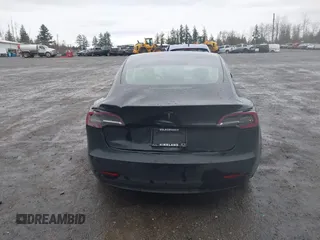 2019 Tesla Model 3 Mid Range with VIN 5YJ3E1EAXKF296378, listed as a IAAI auction lot 41739616 with 77,100 mi miles and . Bid and sale history available at DreamBid. Image 15.