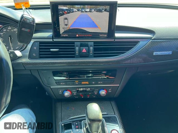 2018 Audi S6 Premium Plus z VIN WAUFFAFC6JN000859, wystawiony jako Copart lot #58193725 z przebiegiem 120 327 mil mil oraz Tytuł czysty. Historia ofert i sprzedaży dostępna na DreamBid. Obrazek 9.