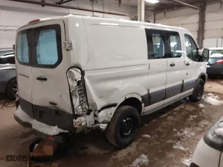 2016 Ford Transit Cargo Van with VIN 1FTYR1ZM1GKB35717, listed as a IAAI auction lot 41711883 with 183,157 mi miles. Bid and sale history available at carsss.com. Image 4.
