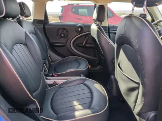 2012 MINI Countryman S with VIN WMWZC3C57CWL80976, listed as a Copart auction lot 50023105 with 74,504 mi miles and Salvage Title. Bid and sale history available at DreamBid. Image 11.