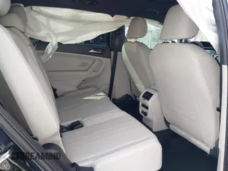 2023 Volkswagen Tiguan SE R-Line Black with VIN 3VVCB7AXXPM094621, listed as a IAAI auction lot 41737103 with 21,069 mi miles and . Bid and sale history available at DreamBid. Image 8.