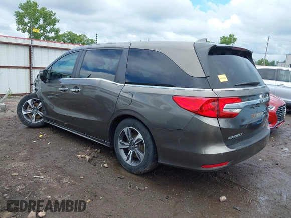 2019 Honda Odyssey Touring with VIN 5FNRL6H81KB038790, listed as a IAAI auction lot 42200190 with 131,761 mi miles and . Bid and sale history available at DreamBid. Image 3.