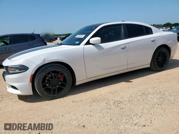 2015 Dodge Charger SXT with VIN 2C3CDXHG0FH862901, listed as a Copart auction lot 61402225 with 128,926 mi miles and Salvage title. Bid and sale history available at DreamBid. Image 1.
