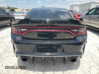 2021 Dodge Charger SRT Hellcat Widebody z VIN 2C3CDXL93MH660916, wystawiony jako Copart lot #51233805 z przebiegiem 27 729 mil mil oraz Czysty tytuł • Clean title. Historia ofert i sprzedaży dostępna na DreamBid. Obrazek 6.