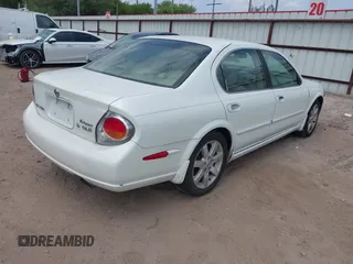 2002 Nissan Maxima GLE z VIN JN1DA31AX2T313083, wystawiony jako IAAI lot #42040751 z przebiegiem 182 814 mil mil oraz . Historia ofert i sprzedaży dostępna na DreamBid. Obrazek 4.