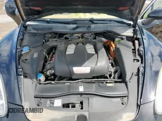 2013 Porsche Cayenne S Hybrid с VIN WP1AE2A20DLA14095, выставлен на аукционе Copart как лот 64215625 с пробегом 148 286 миль миль и Списание • Salvage title. История ставок и продаж доступна на DreamBid. Изображение 11.
