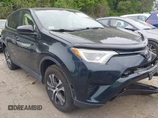 2018 Toyota RAV4 LE with VIN JTMBFREV8JJ739869, listed as a IAAI auction lot 42306774 with 100,784 mi miles and . Bid and sale history available at DreamBid. Image 1.