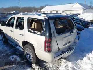 2014 GMC Yukon Denali with VIN 1GKS2EEF3ER181504, listed as a IAAI auction lot 41267224 with 165,478 mi miles. Bid and sale history available at carsss.com. Image 6.