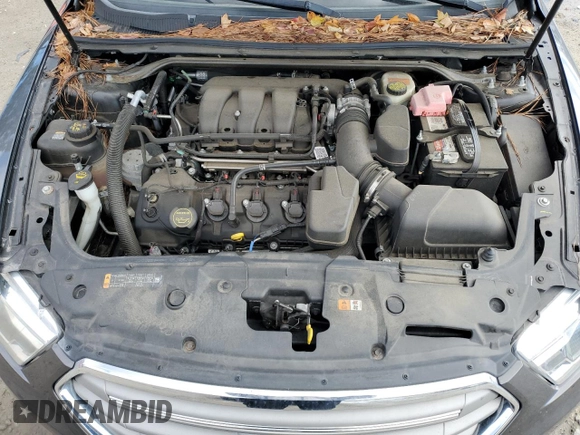 2015 Ford Taurus SEL with VIN 1FAHP2H86FG115860, listed as a Copart auction lot 43218065 with 99,548 mi miles and Salvage Title. Bid and sale history available at DreamBid. Image 11.