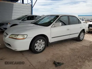 1999 Honda Accord LX with VIN 1HGCG5642XA029781, listed as a Copart auction lot 58059505 with 228,434 mi miles and Salvage title. Bid and sale history available at DreamBid. Image 1.