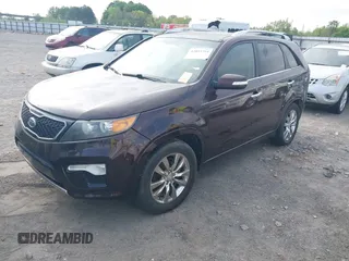 2011 Kia Sorento SX with VIN 5XYKW4A28BG127753, listed as a IAAI auction lot 42033754 with 163,470 mi miles. Bid and sale history available at carsss.com. Image 2.