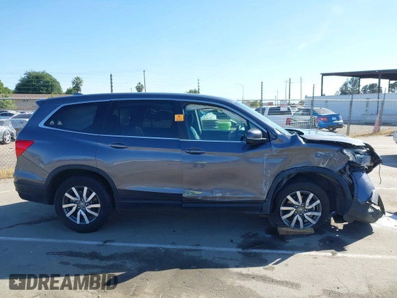 2020 Honda Pilot EX-L with VIN 5FNYF5H51LB020830, listed as a IAAI auction lot 42255746 with 60,503 mi miles and . Bid and sale history available at DreamBid. Image 14.
